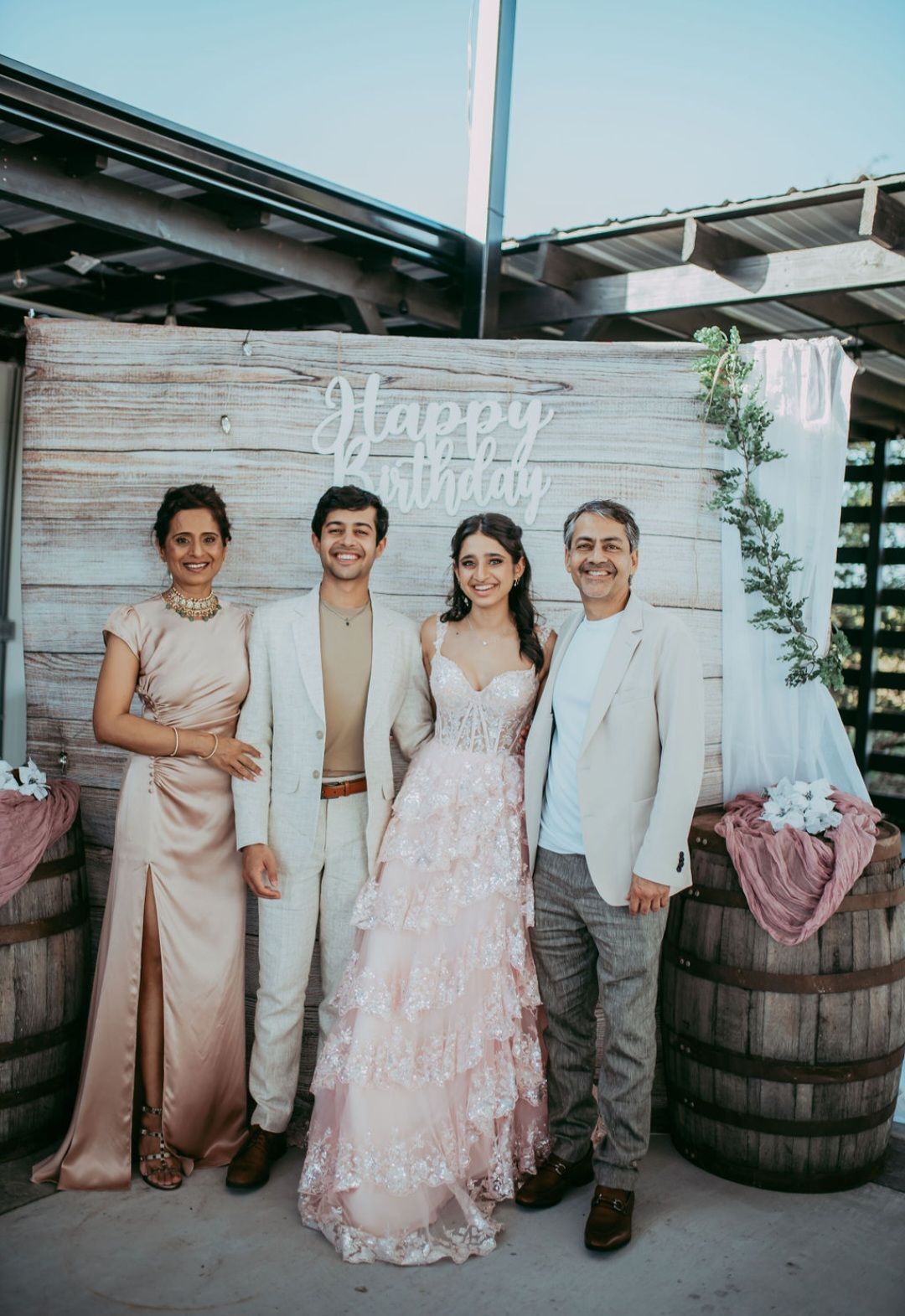 A group of people smiling and standing together for a photo at an event in Austin, TX