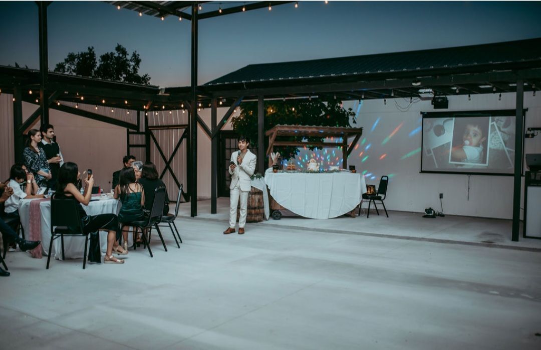 A man giving a speech to a group of people during an event in Austin, TX