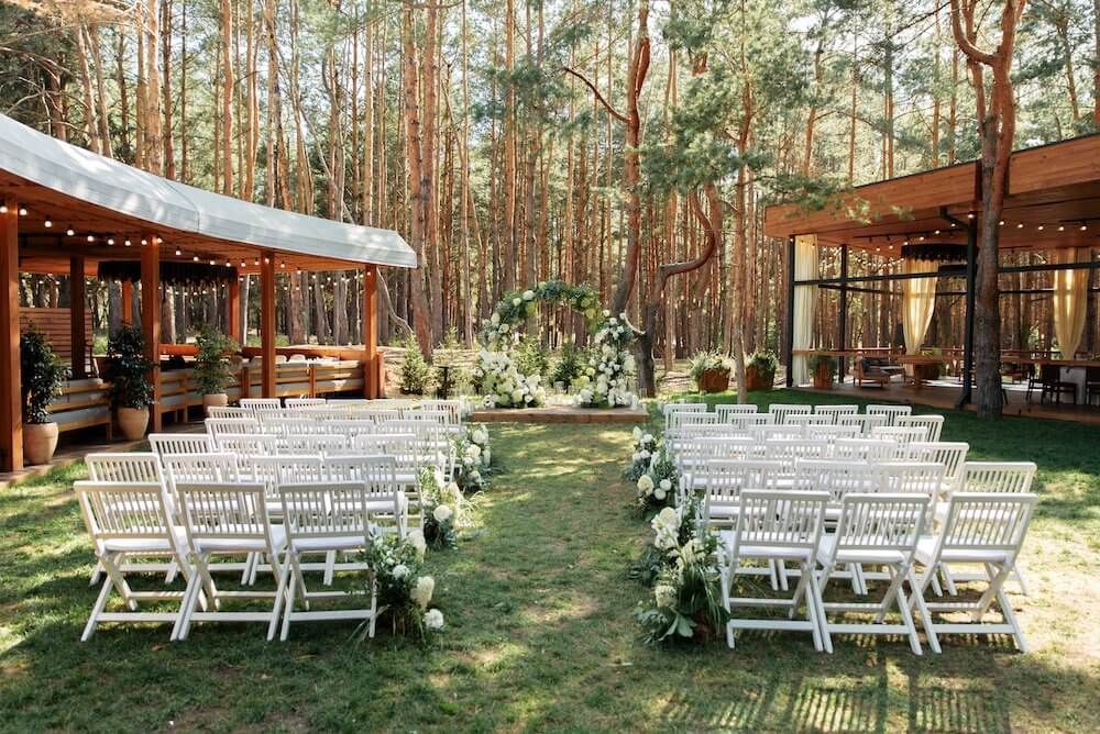 Outdoor wedding ceremony in the woods.