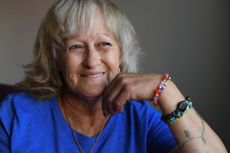 Linda Southwood sits for a portrait during the Community Supported Shelters arts entrepreneurship program graduation in Eugene, Oct. 21, 2025. Credit: Isaac Wasserman / Lookout Eugene-Springfield / Catchlight / RFA