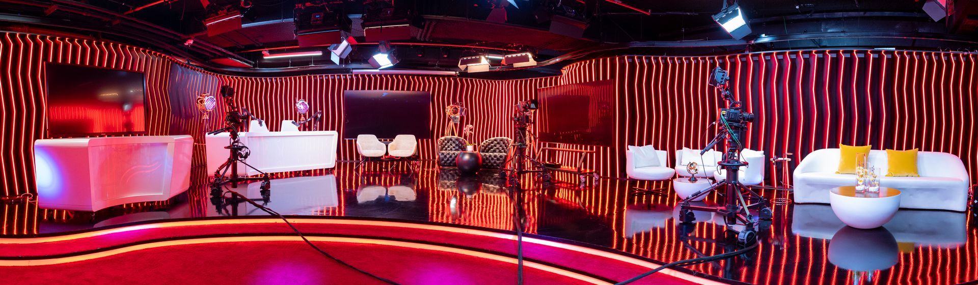 A very large room with a lot of lights on the walls.