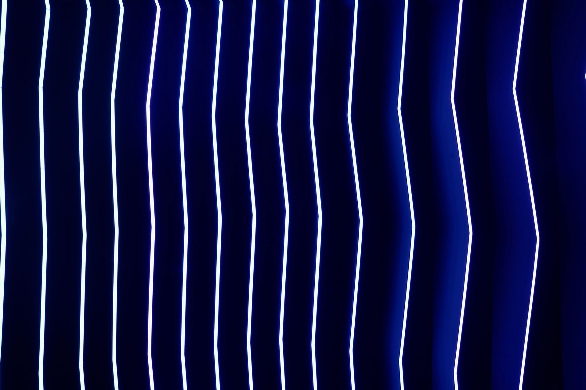 A blue curtain with white stripes on it