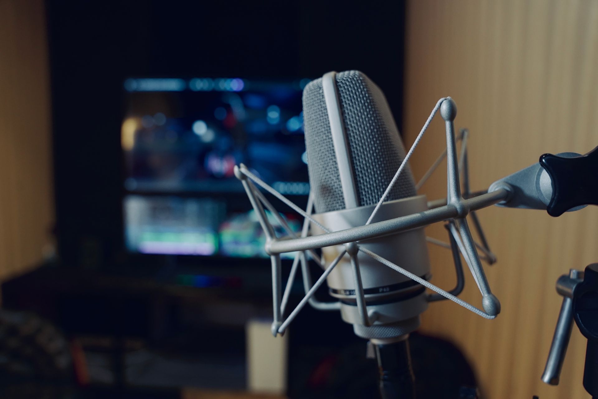A close up of a microphone in a recording studio.