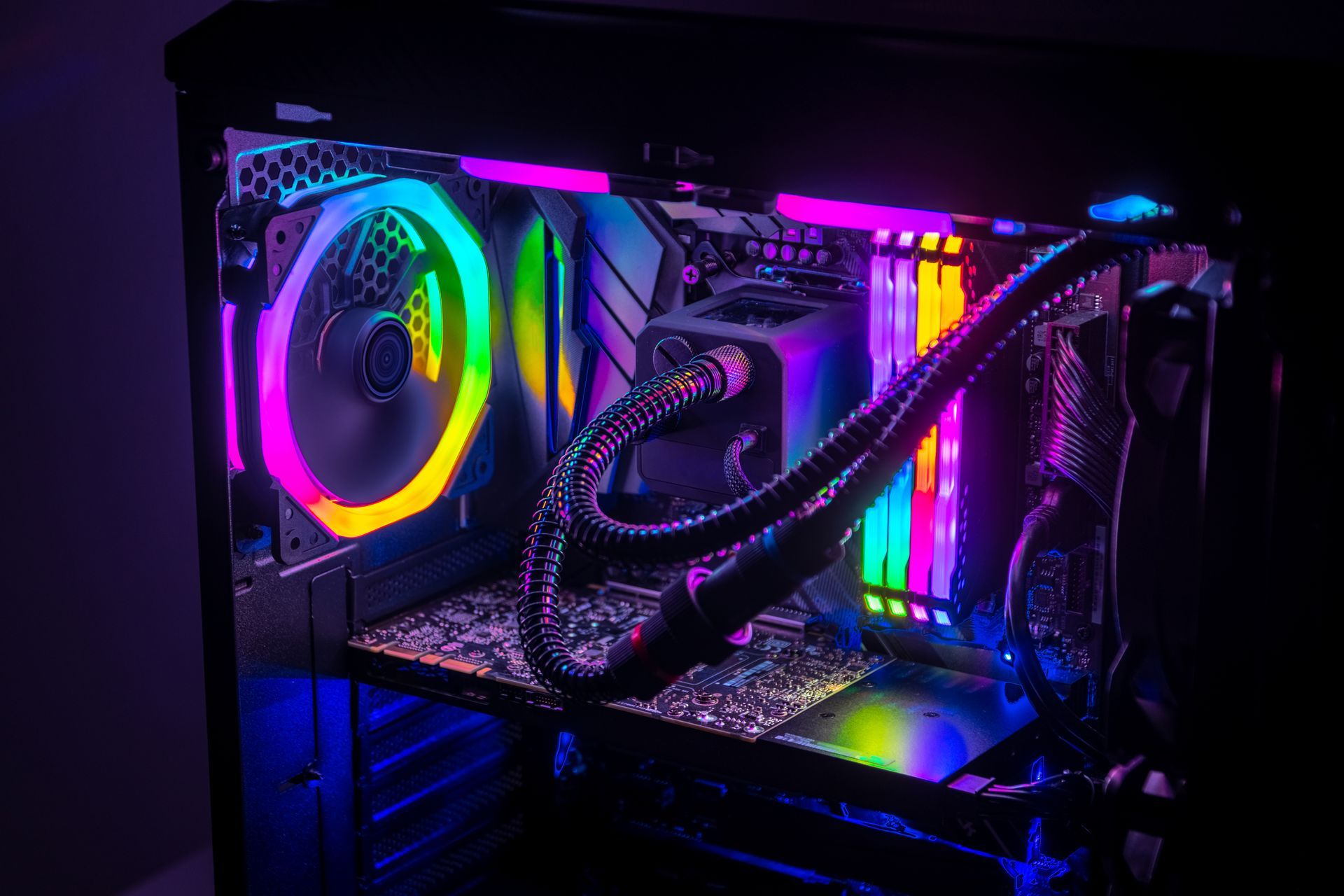 A computer case with a lot of colorful lights on it.