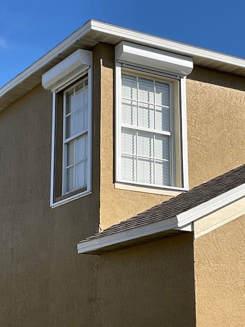 A house with a window on the side of it