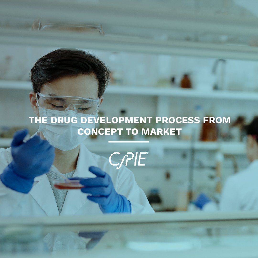 A man wearing a mask and gloves is working in a lab