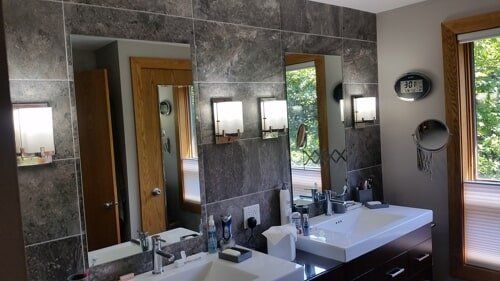 Bathroom Carpentry — Bathroom With Sink and Mirrors in Lewisville, TX