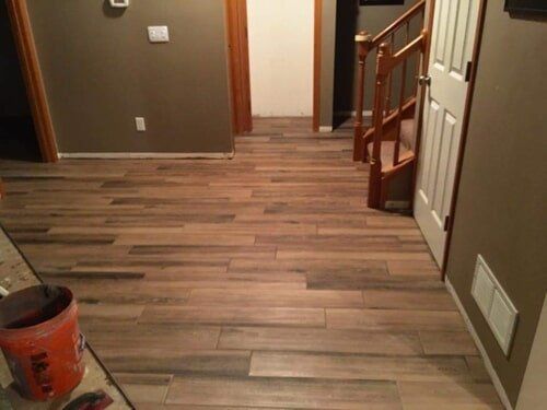 Flooring — House With Wooden Tiles in Lewisville, TX