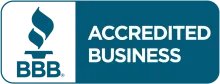 A blue and white sign that says accredited business