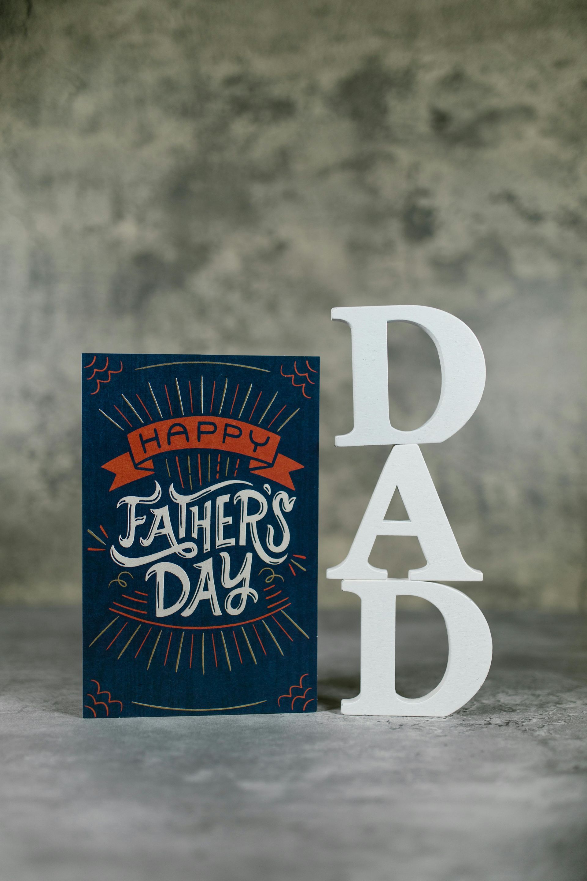 a sign and a card that days dad