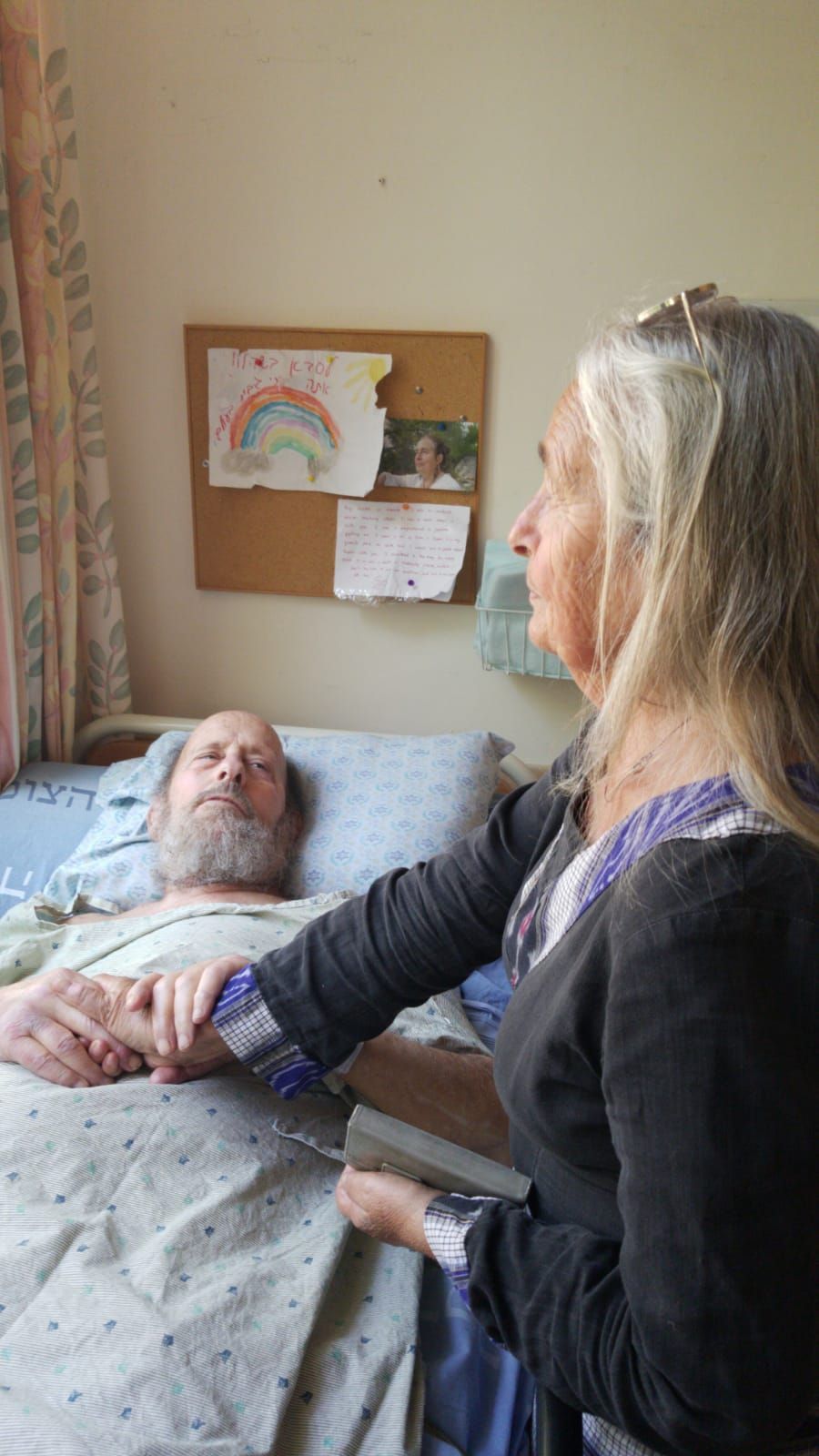 June Leavitt by her dying husband's bed.  Dr. June by her dying husband's bed.