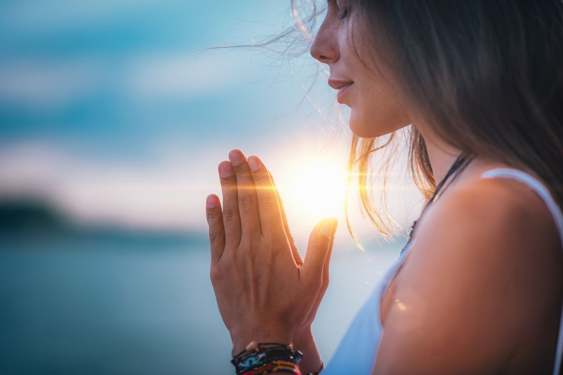 Image of a woman praying and finding peace