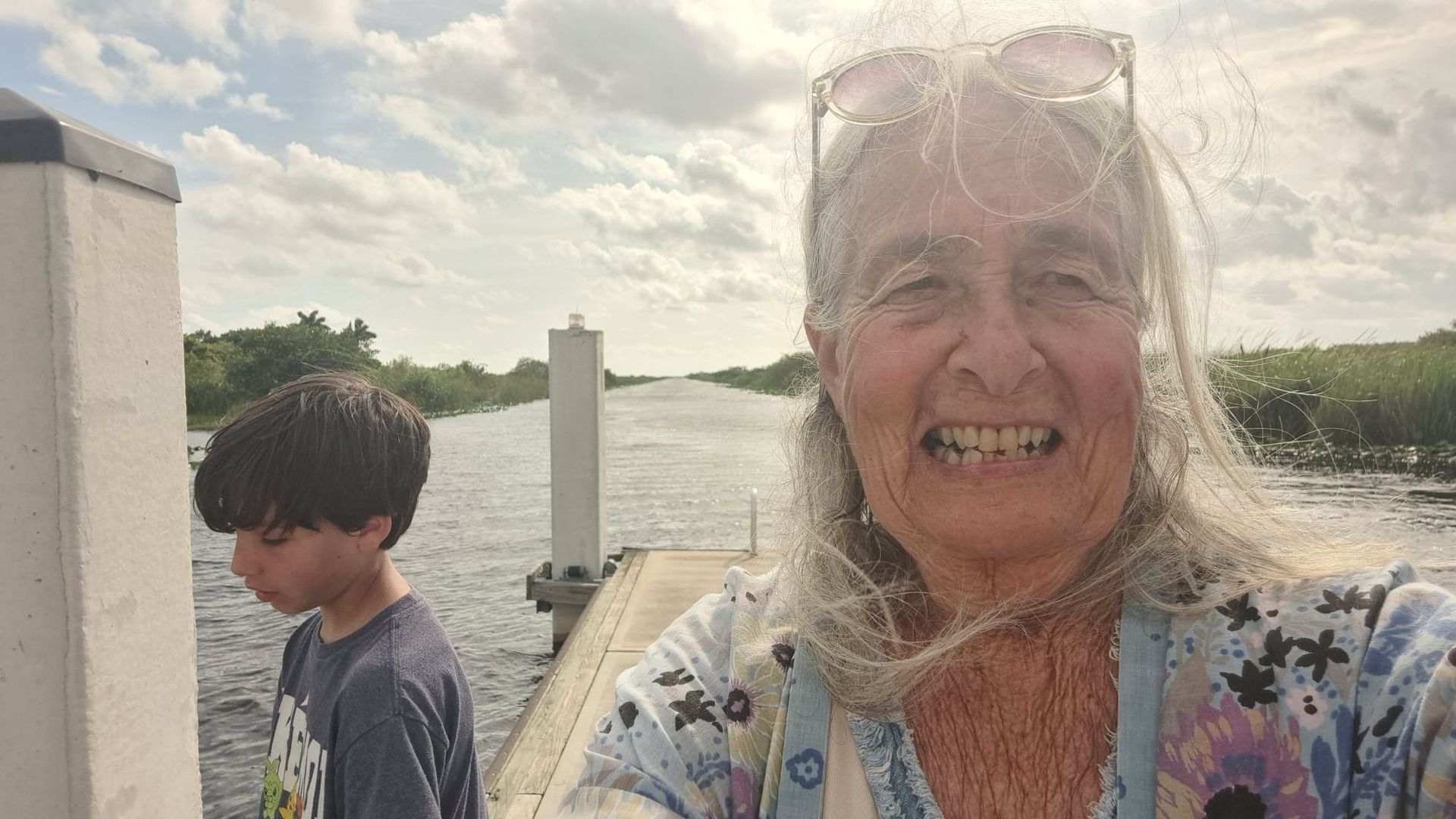 older woman with grandson on canal