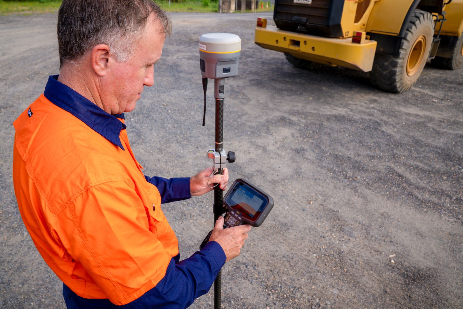 A Fence Is Broken In The Middle Of A Grassy Field — TerraModus Surveying In Bayview Heights, QLD