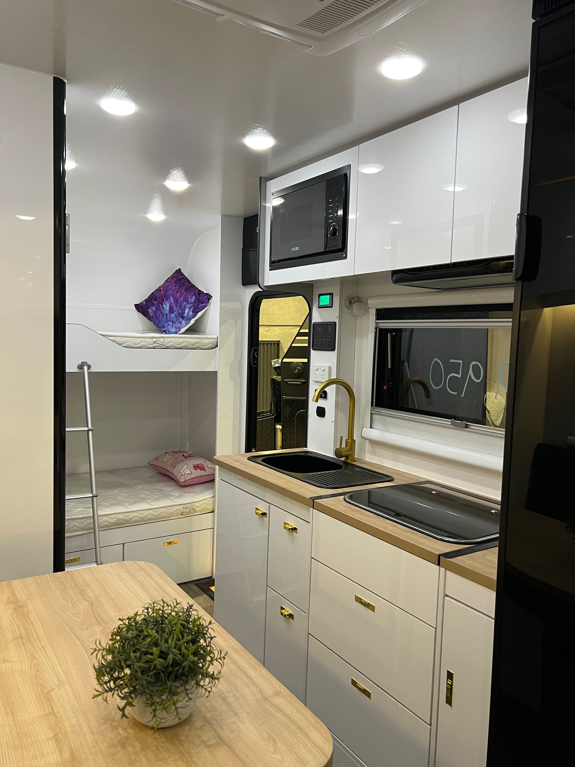 Oz Star Kookaburra with bed and kitchen visible