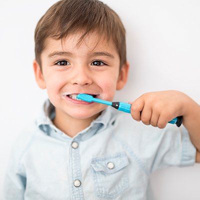 Boy Brushing His Teeth — Newton, SA — Arena Dental