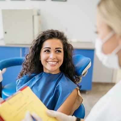 Woman Smiling To Dentist — Newton, SA — Arena Dental