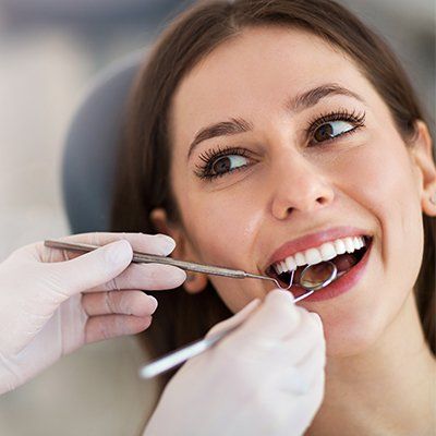 Woman Having Teeth Examined — Newton, SA — Arena Dental
