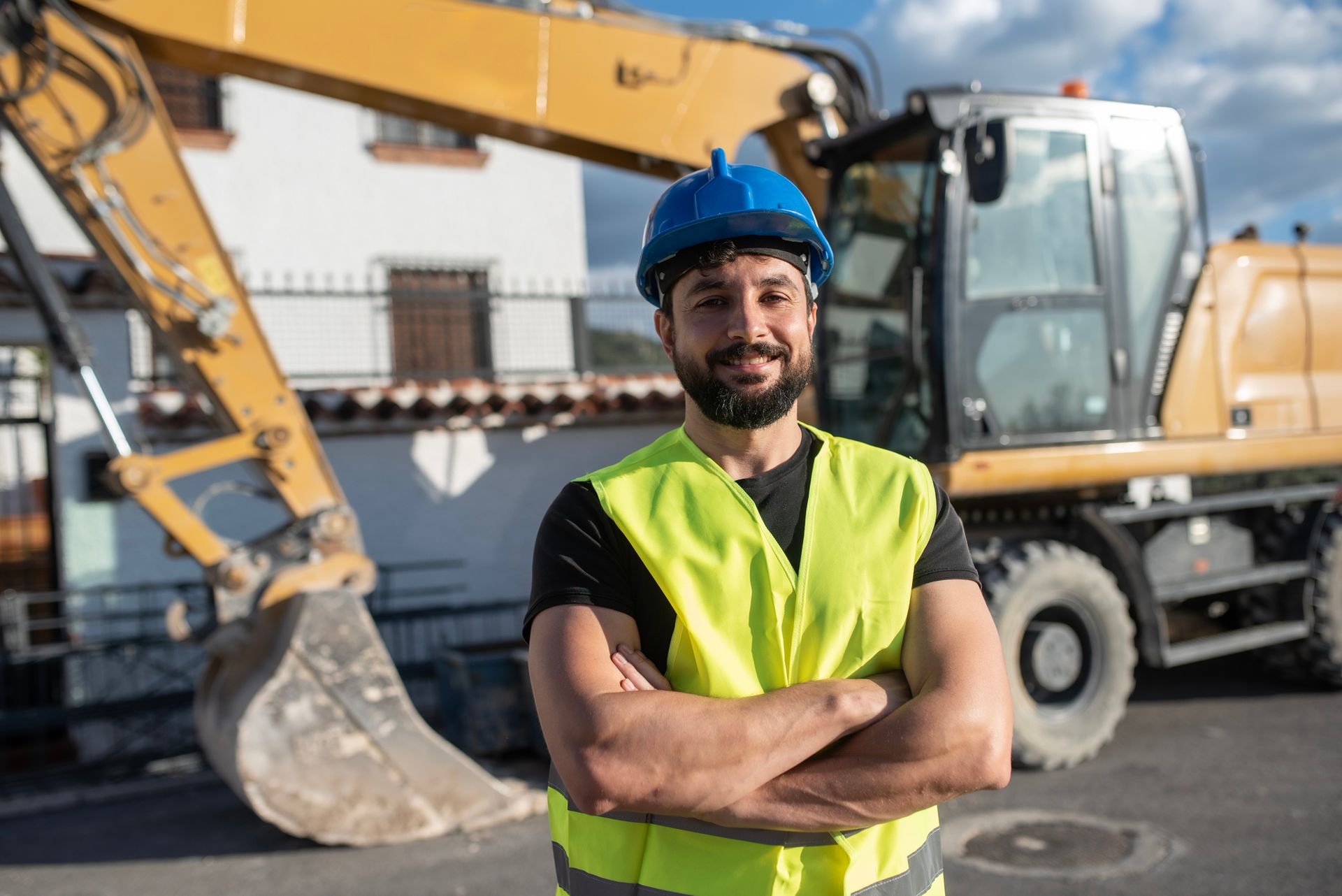 Construction worker man portrait outdoors.