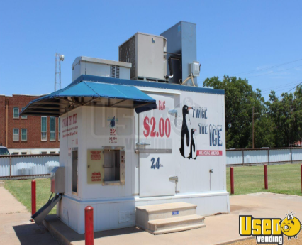 A white building with a sign that says $ 2.00 on it