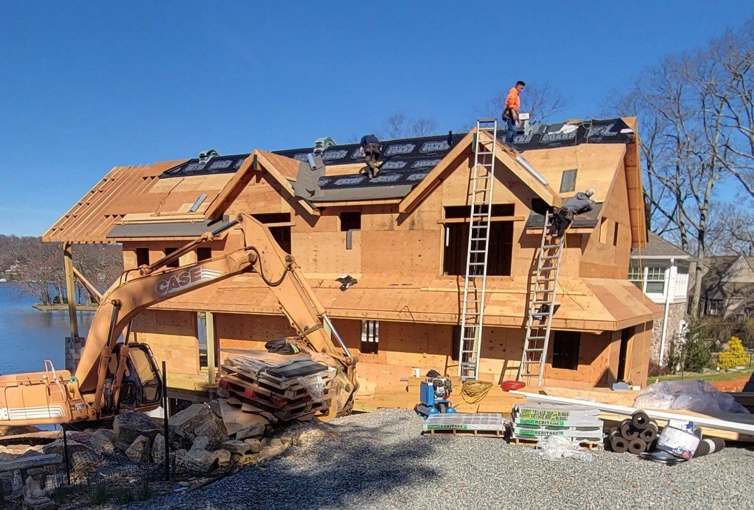 New construction roofing installation on a residential building
