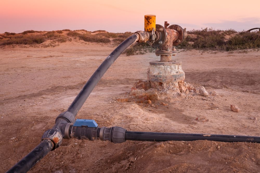 Well Pump and Pipes on Dry Land, Sunset — NRG Drilling in Cooroy, QLD