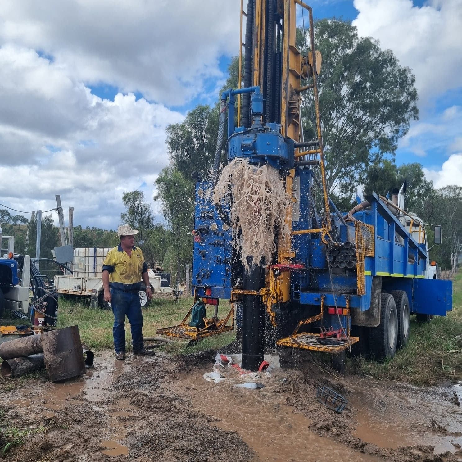 Well Drilling Rig Spraying Water and Mud — NRG Drilling in Calico Creek, QLD