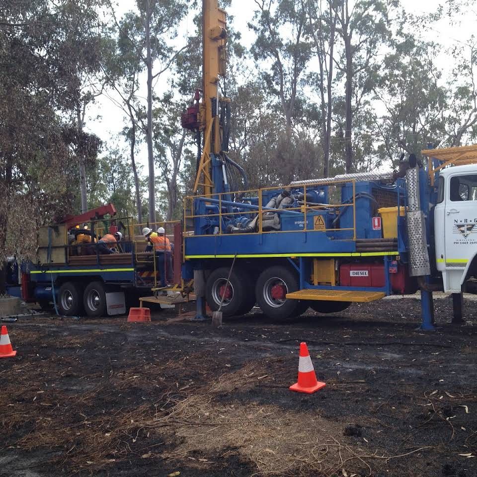 Drilling Rig in a Wooded Area, With Workers — NRG Drilling in Kingaroy, QLD