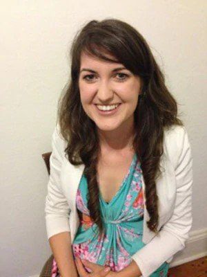 woman wearing colorful blue dress