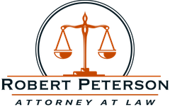 The logo for robert peterson attorney at law shows a scale of justice in a circle.