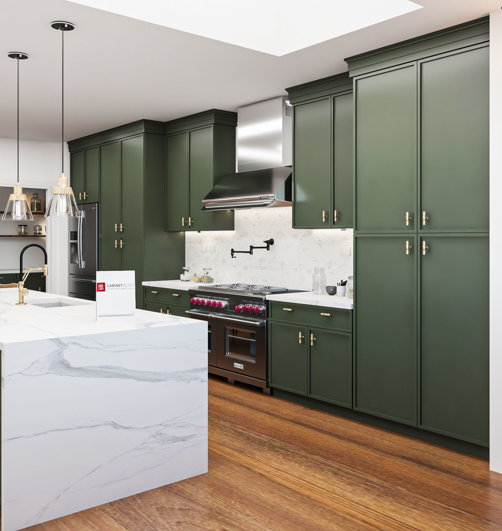 Green kitchen with a marble island, stainless steel appliances, and wood flooring.