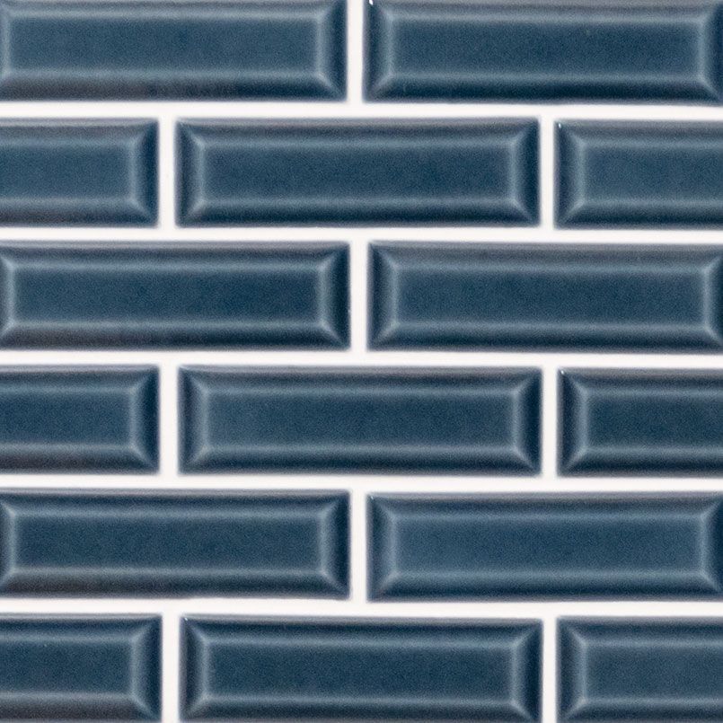 Dark blue, rectangular tile brick wall pattern.