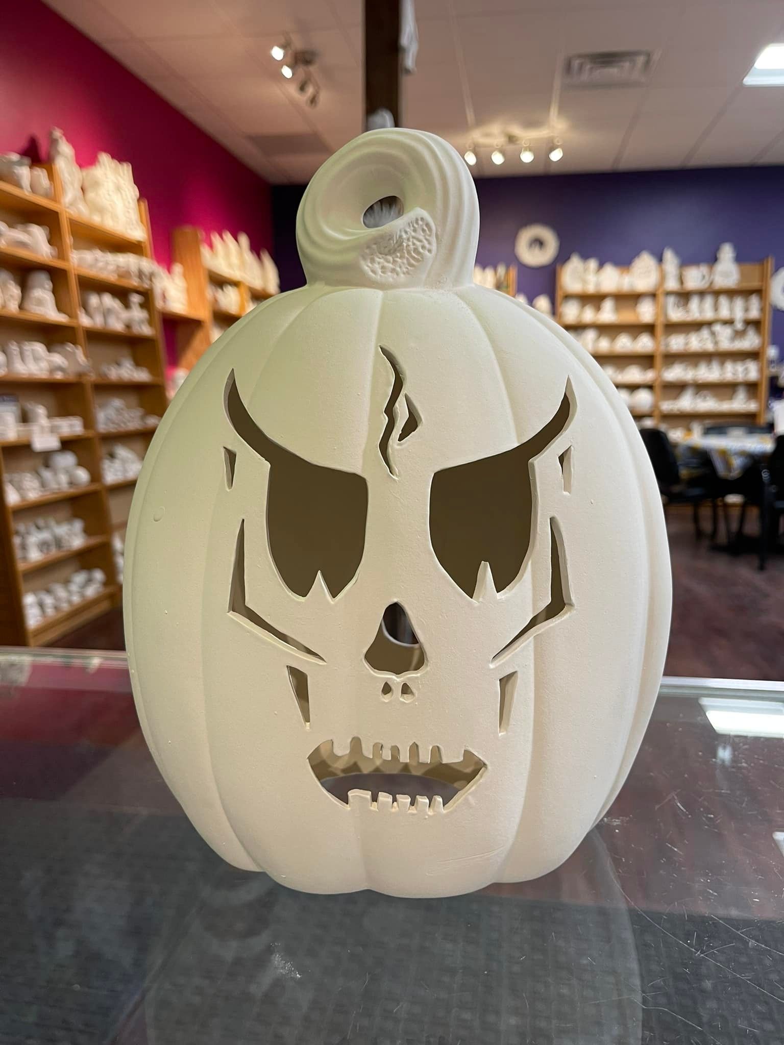 A payless shoesource store with a blue awning