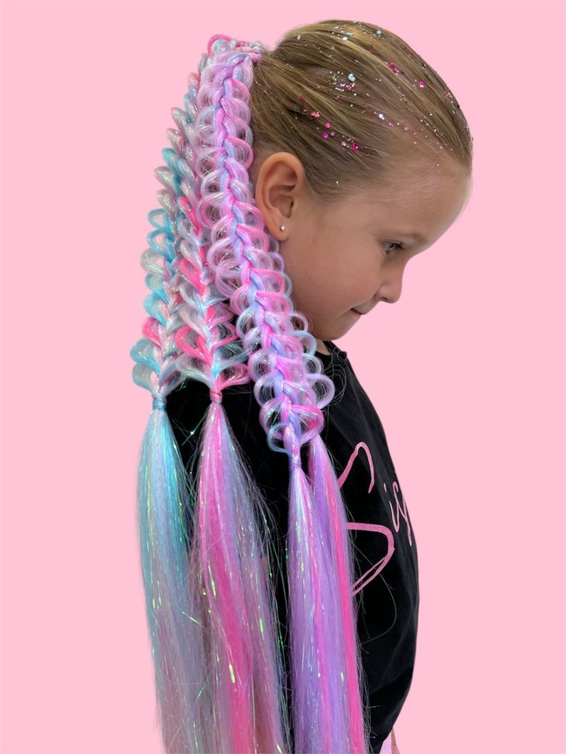 A Little Girl Is Wearing A Ponytail With Pink And Blue Hair Extensions — Mjay's Hair Studio & Spa In Dubbo, NSW