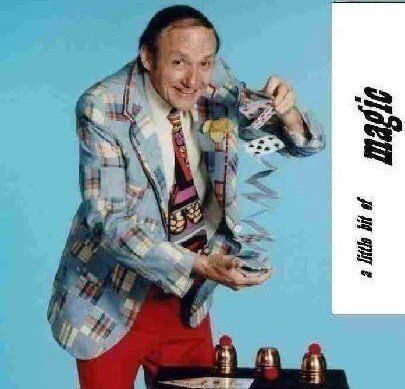 A man in a plaid jacket and tie is performing a magic trick