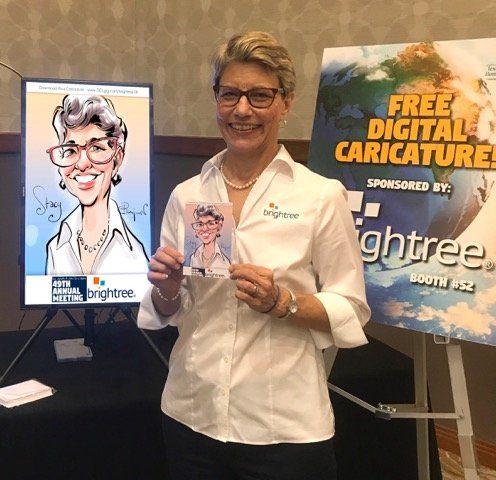 A woman is standing in front of a sign that says free digital caricatures