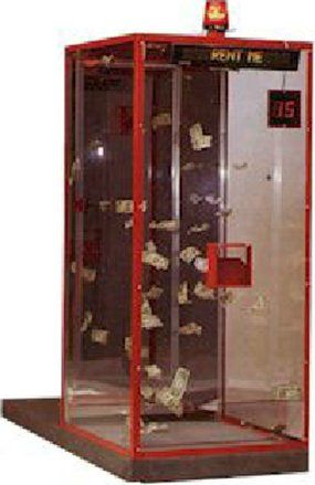 A red box with money falling out of it.