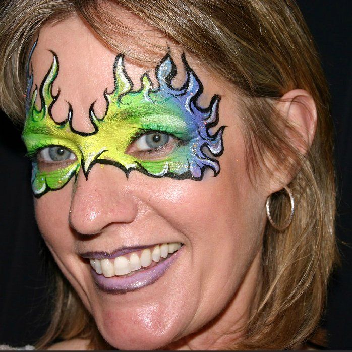 A woman with flames painted on her face