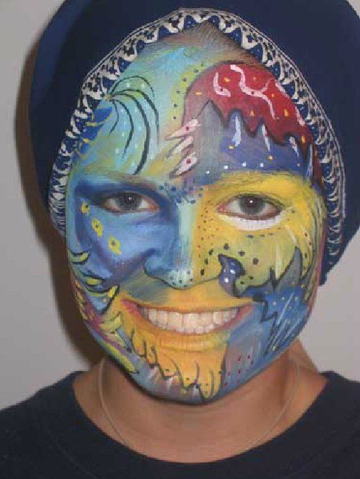 A person with a colorful face painted on their face