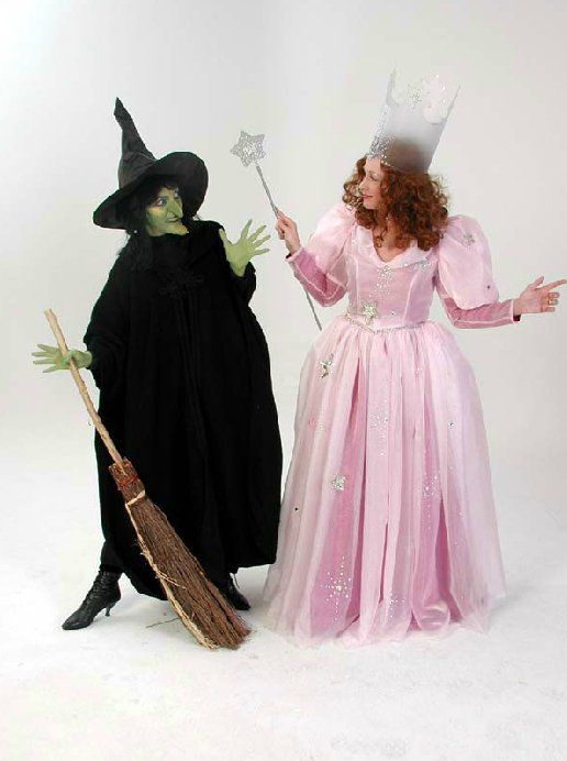 A witch and a fairy are standing next to each other