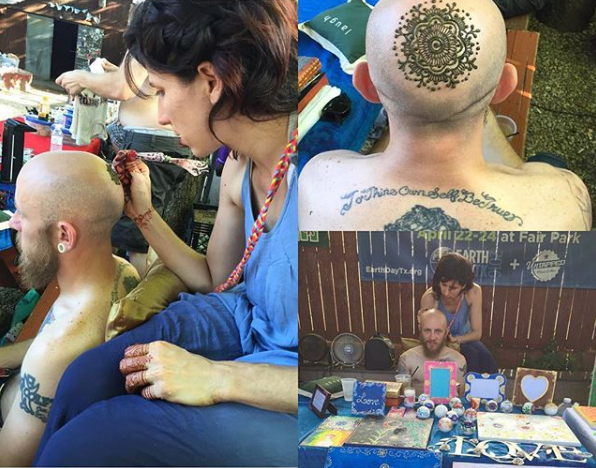 A woman is applying henna to a man 's head