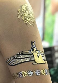 A close up of a tattoo on a person 's arm