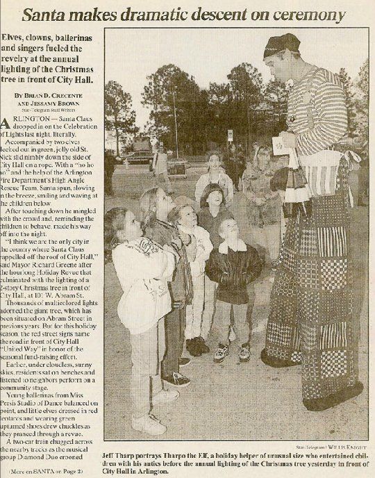 A newspaper article about santa making dramatic descent on ceremony