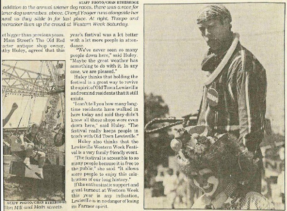 A black and white photo of a man in a military uniform