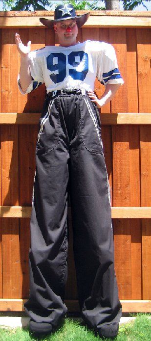 A man wearing a football jersey with the number 99 on it