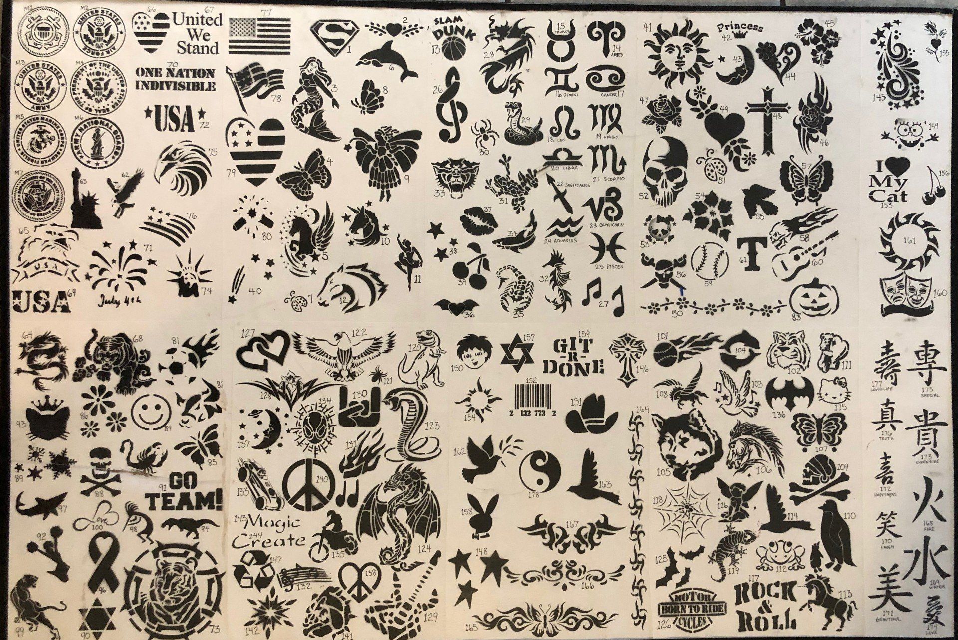 A sheet of stamps with a peace sign on it