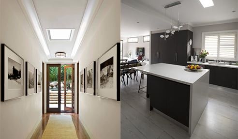 A Hallway With Pictures On The Wall And A Kitchen With A Large Island — The Woolmen In Alstonville, NSW
