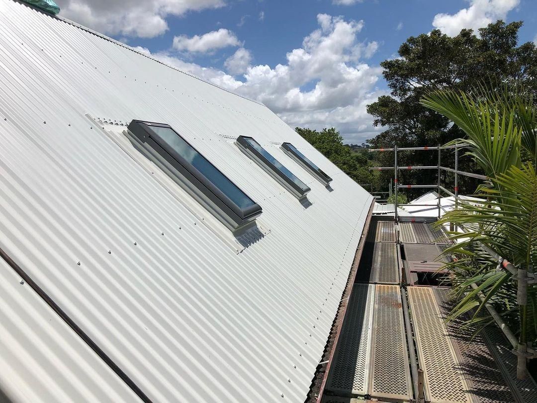 A White Roof With Three Skylights On It — The Woolmen In Yamba, NSW