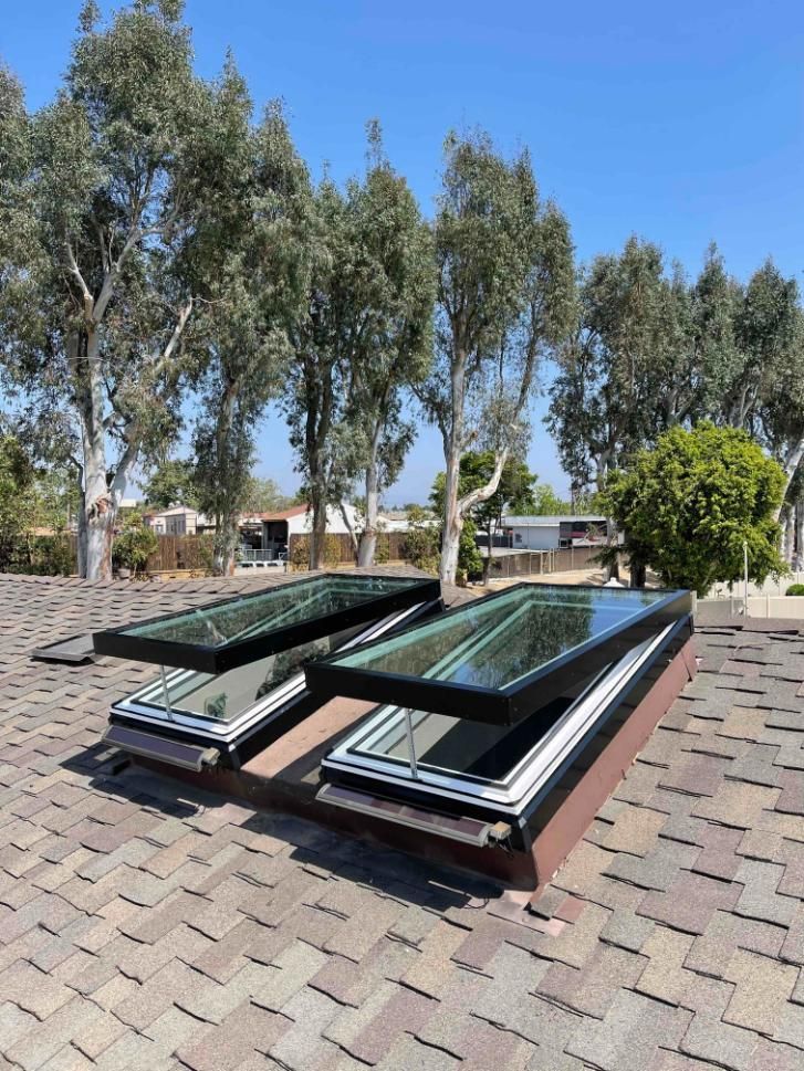 Two Skylights Are Sitting On Top Of A Brick Roof — The Woolmen In Murwillumbah, NSW