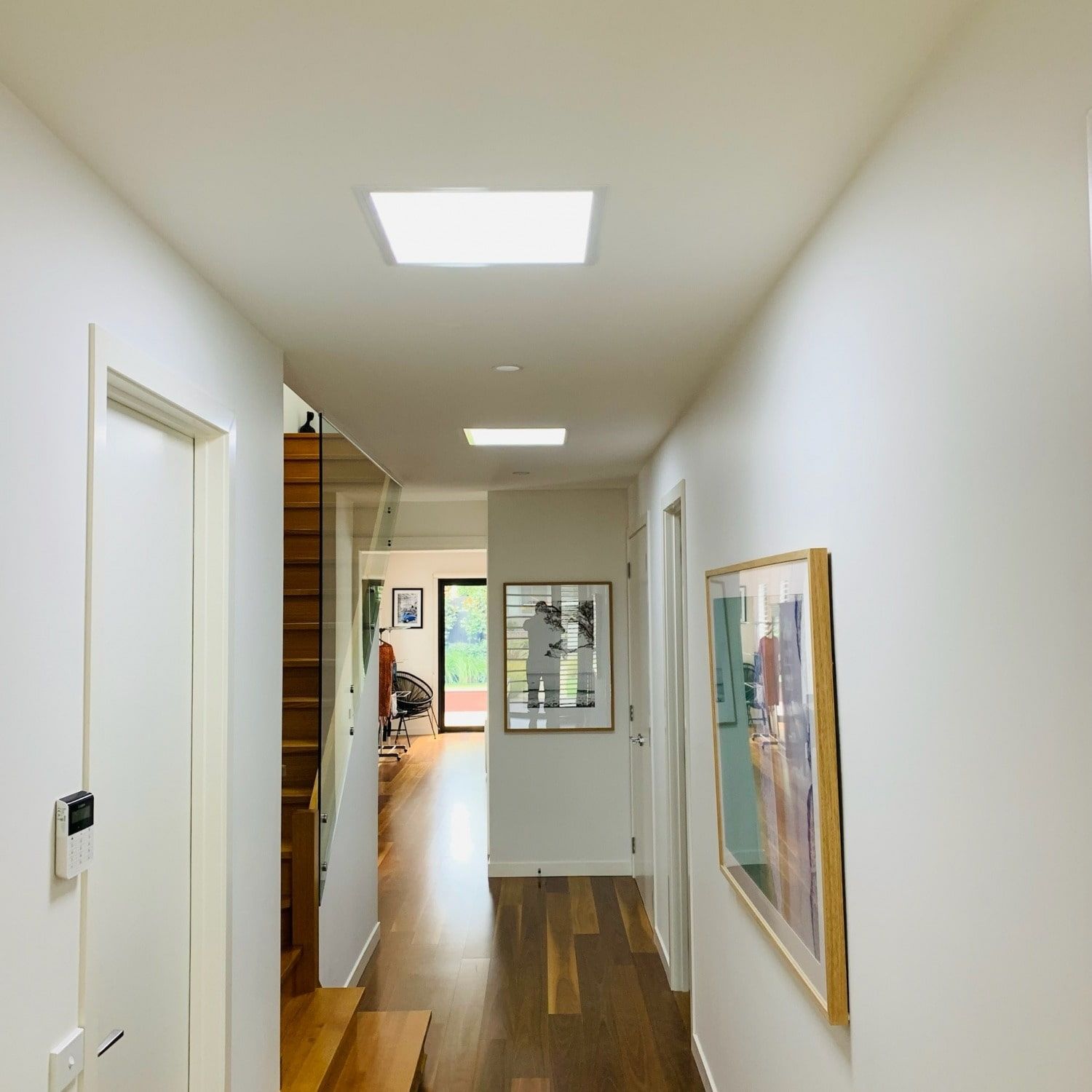 A Hallway With Stairs And A Picture On The Wall — The Woolmen In Lismore, NSW